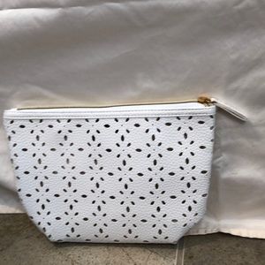 Make up or travel bag. Never used was a gift.